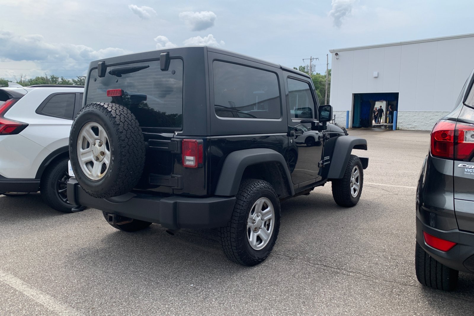Used 2013 Black Jeep Sport image 4