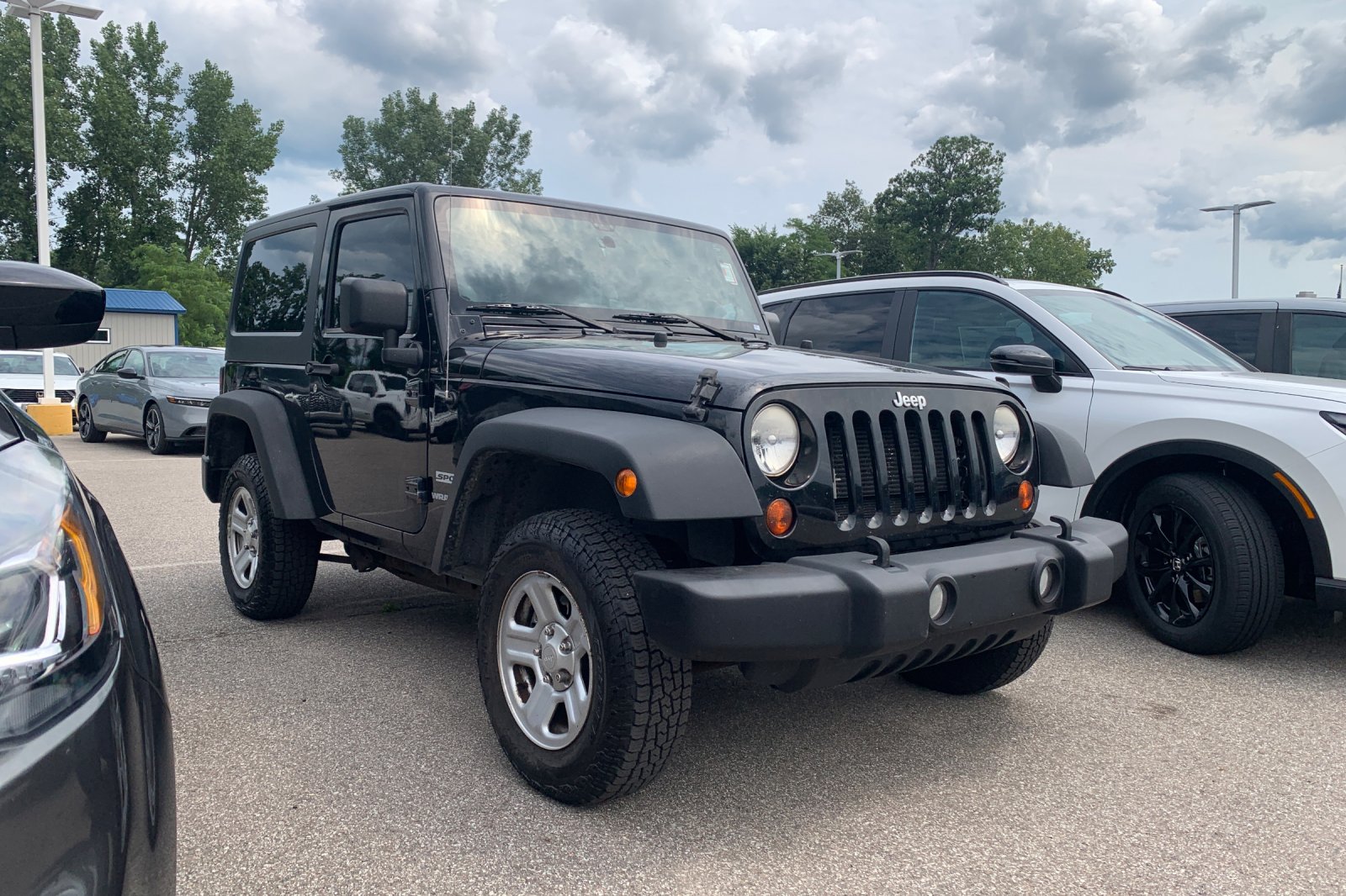 Used 2013 Black Jeep Sport image 6