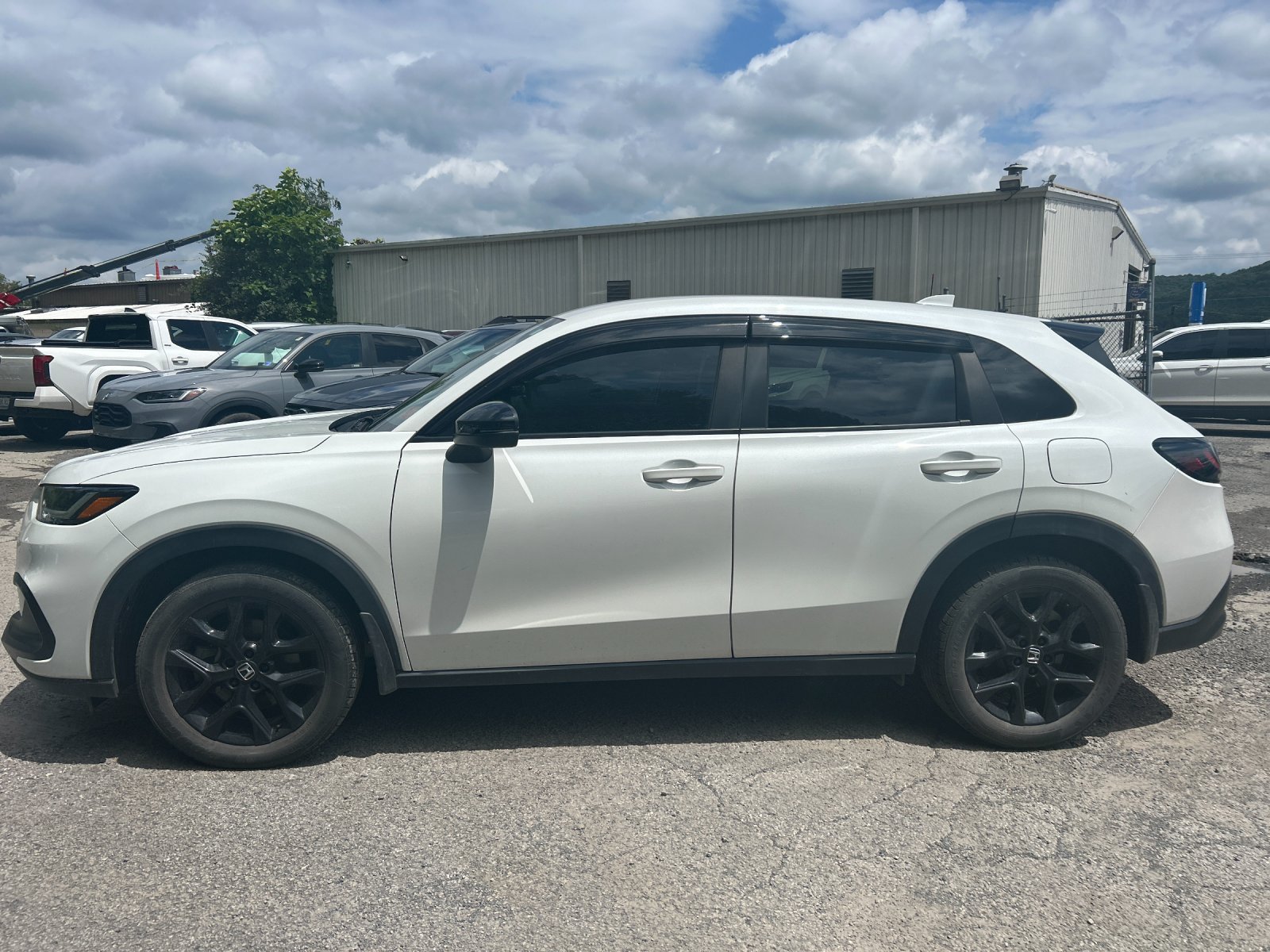 Used 2023 Platinum White Pearl Honda Sport image 2