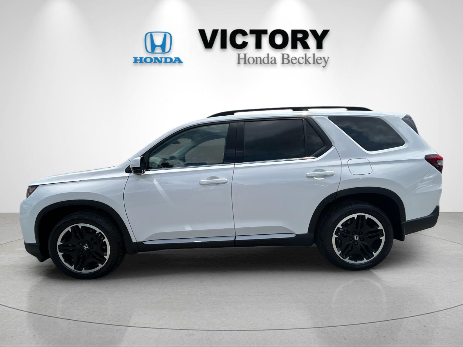 New 2026 Platinum White Pearl Honda AWD Touring Blackout image 2
