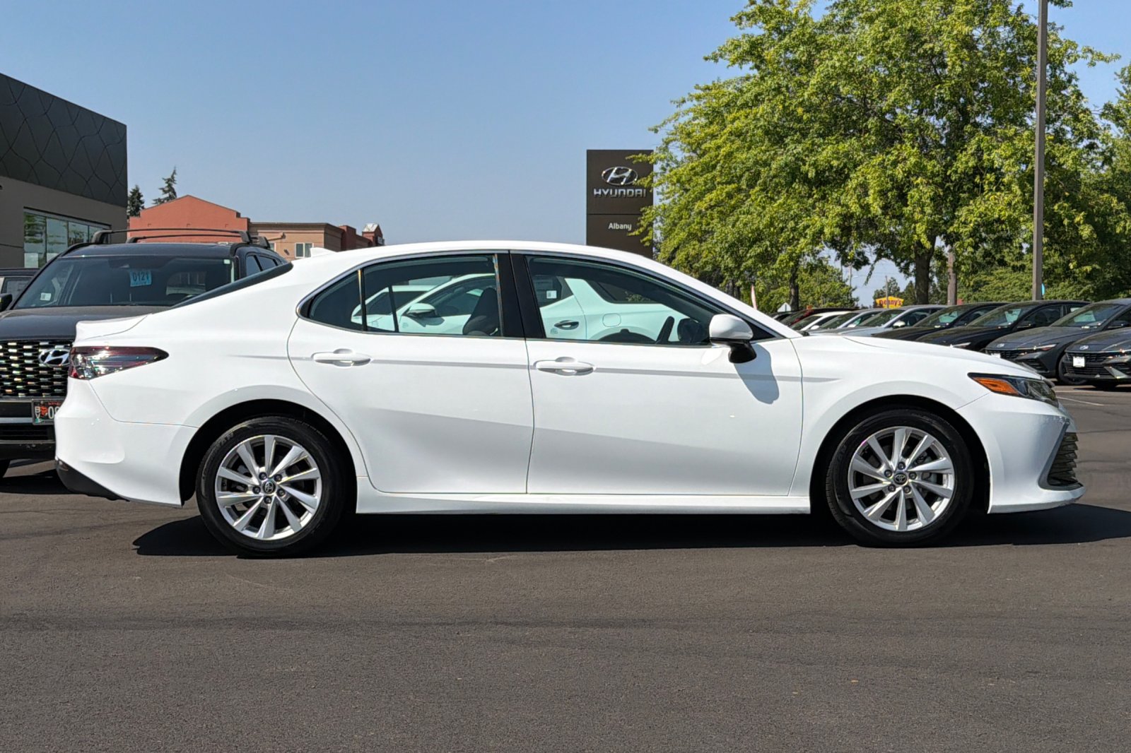 Used 2023 White Toyota LE image 3