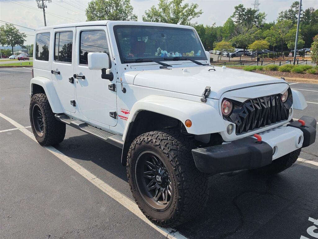 Used 2016 Bright White Clearcoat Jeep Sahara image 2