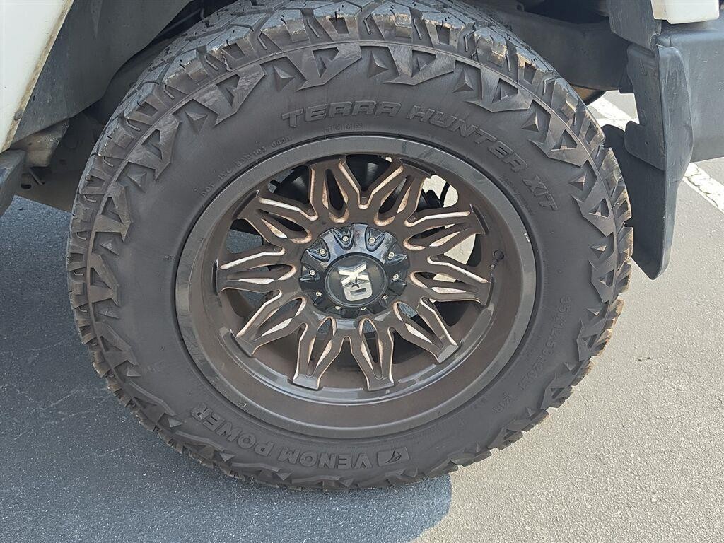 Used 2016 Bright White Clearcoat Jeep Sahara image 3