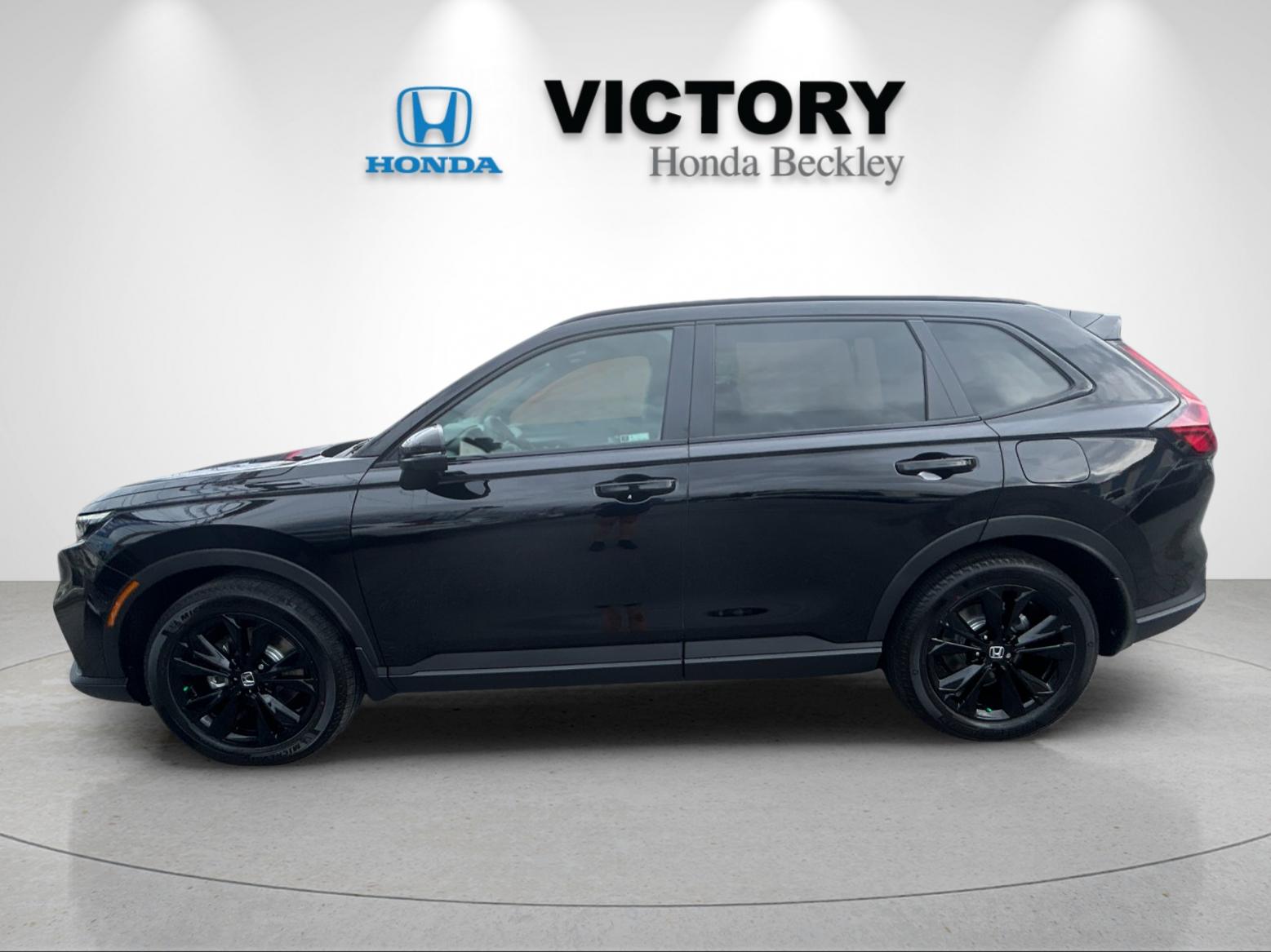 New 2026 Crystal Black Pearl Honda AWD Sport Touring Hybrid image 2