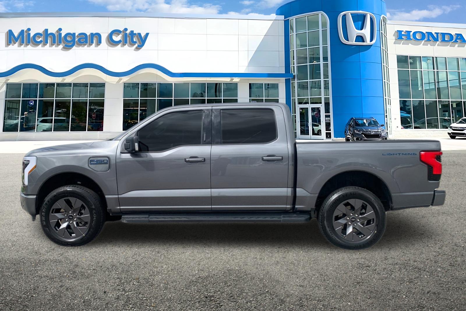 Used 2024 Ford F-150 Lightning Flash with VIN 1FT6W3L72RWG08308 for sale in Michigan City, IN