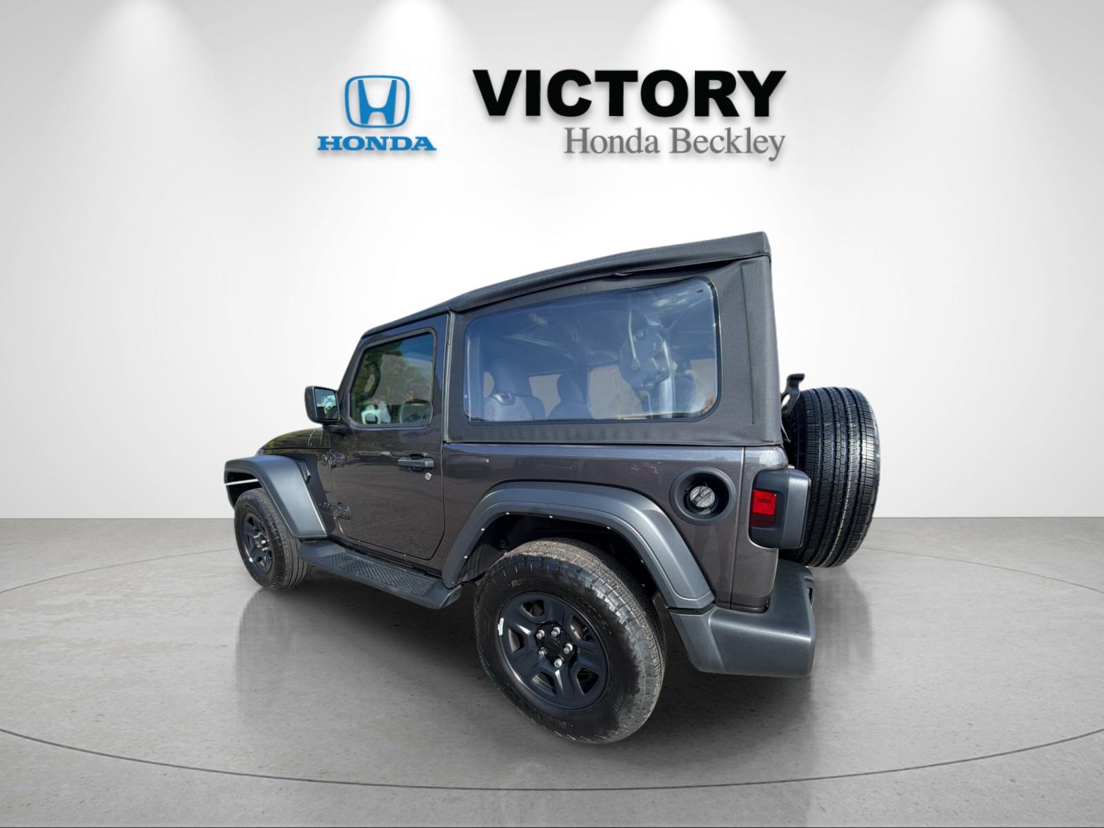 Used 2025 Crystal Metallic Jeep Sport image 3