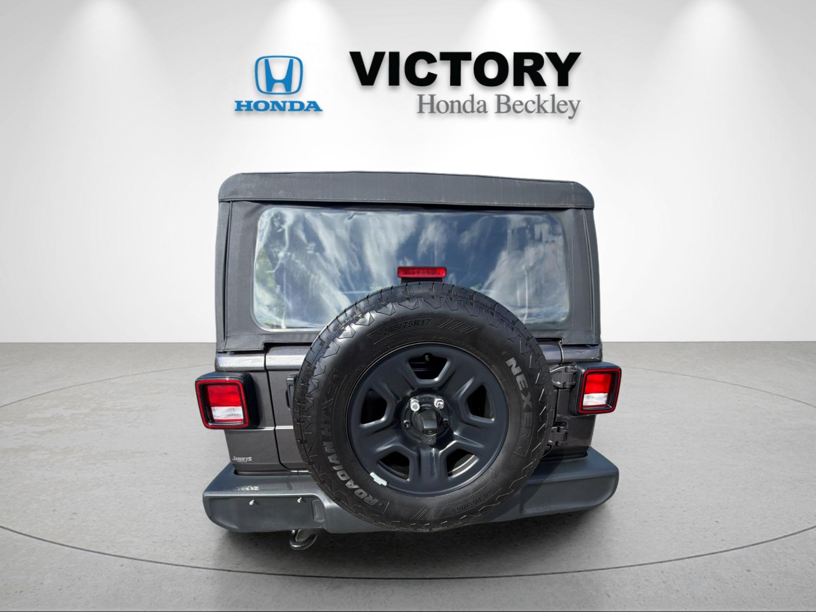 Used 2025 Crystal Metallic Jeep Sport image 4