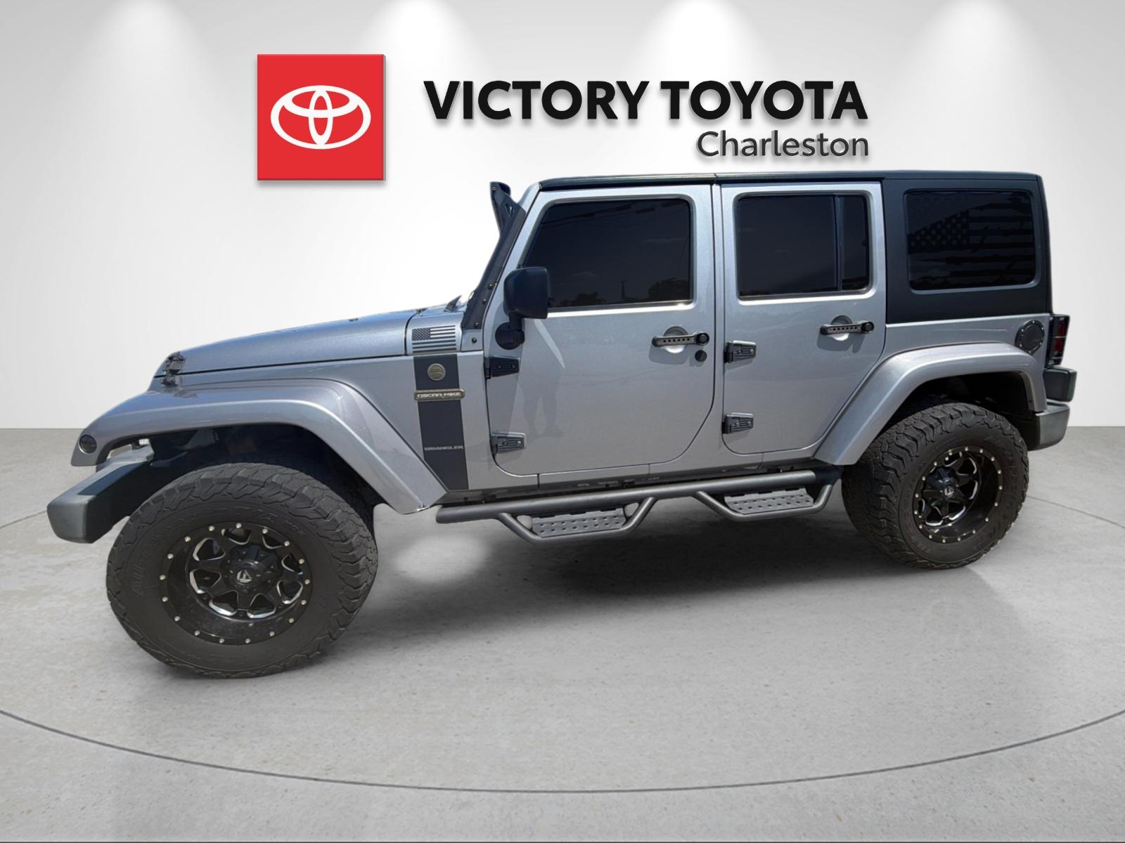 Used 2016 Silver Jeep Unlimited Sport image 2
