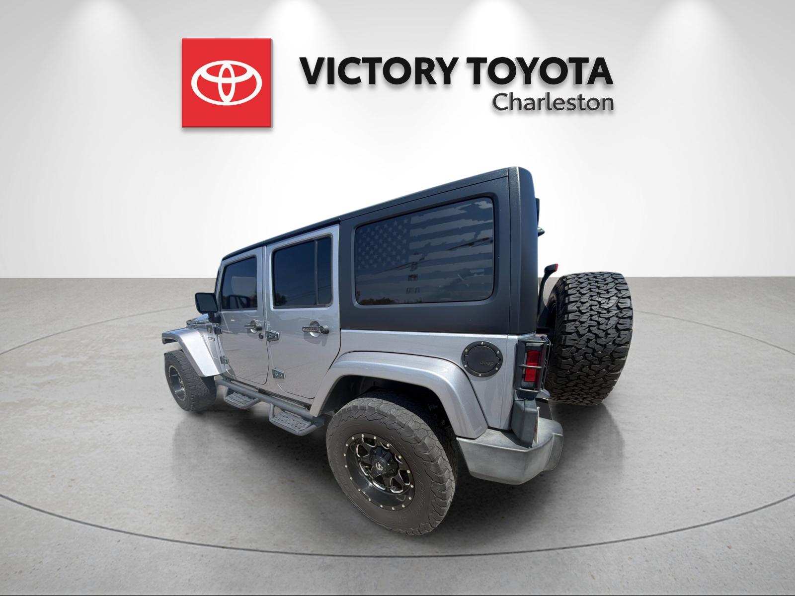 Used 2016 Silver Jeep Unlimited Sport image 3