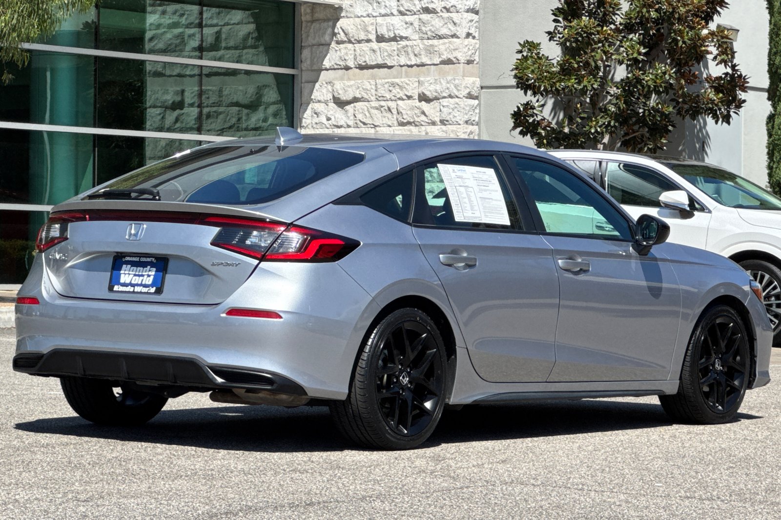 Certified Used 2025 Solar Silver Metallic Honda Sport image 4