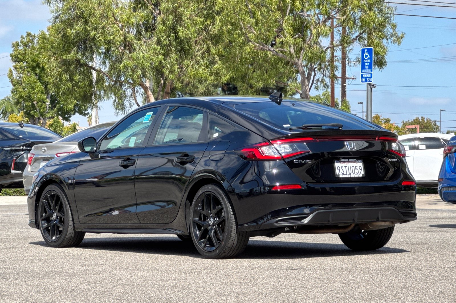 Certified Used 2025 Crystal Black Pearl Honda Sport image 6