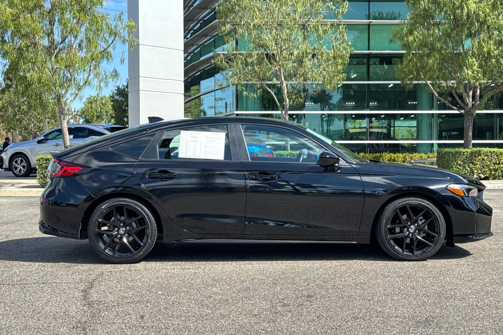 Certified Used 2025 Crystal Black Pearl Honda Sport image 3
