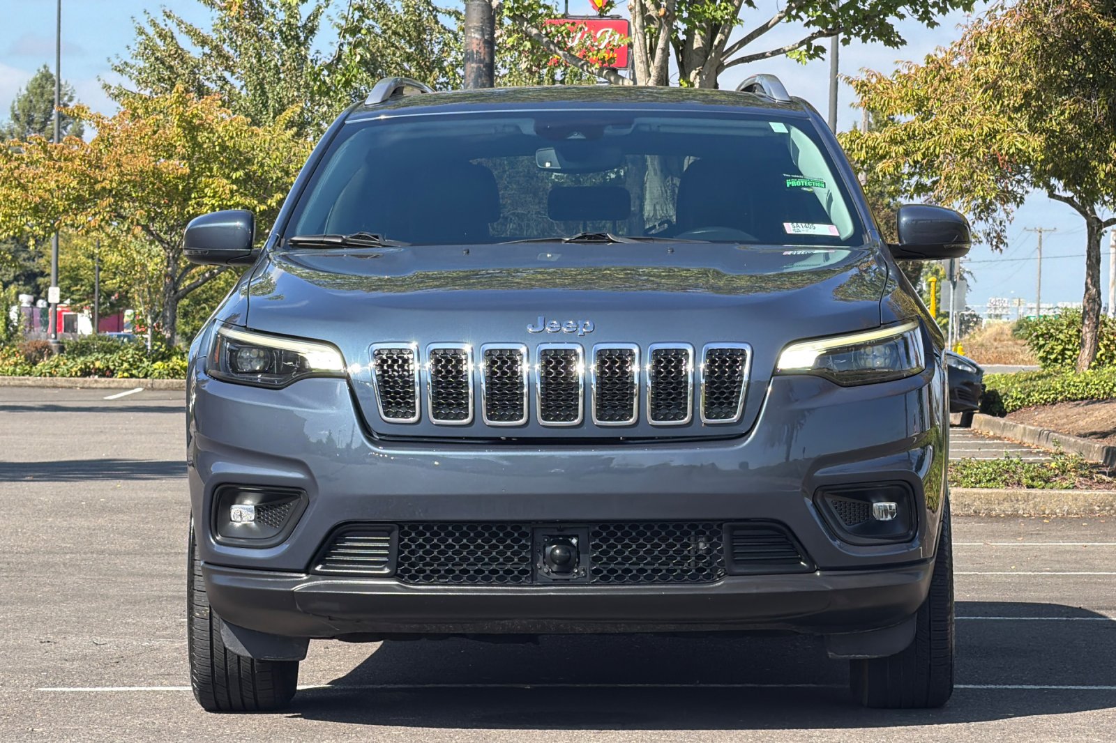 Used 2021 Slate Blue Pearlcoat Jeep Latitude Lux image 9