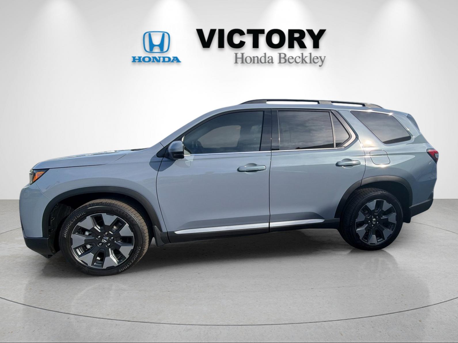 New 2026 Sonic Gray Pearl Honda AWD Elite image 2