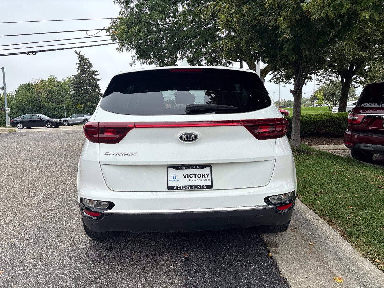 Used 2021 Clear White Kia LX image 6