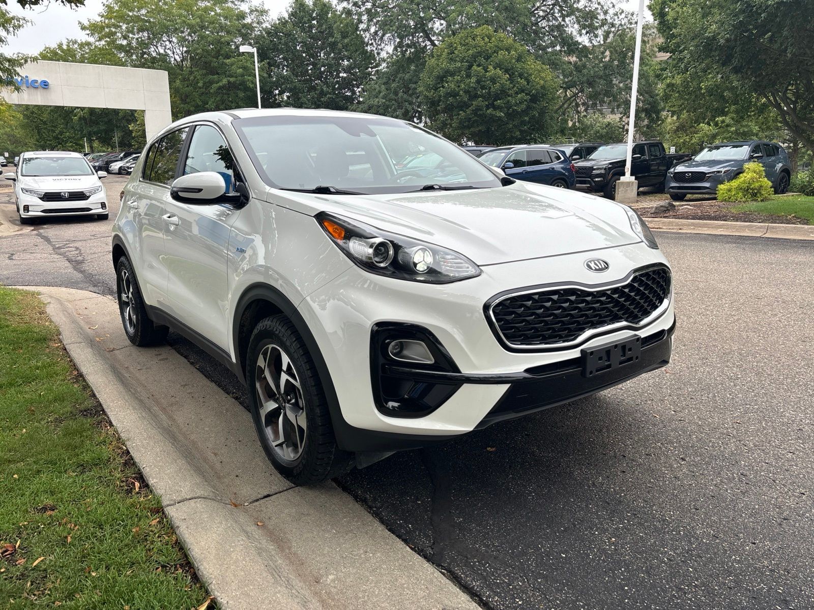 Used 2021 Clear White Kia LX image 11