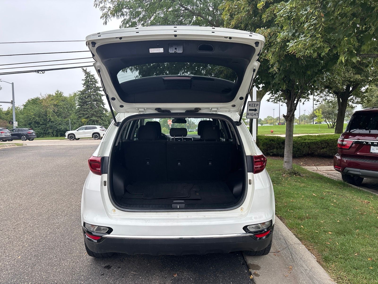 Used 2021 Clear White Kia LX image 13