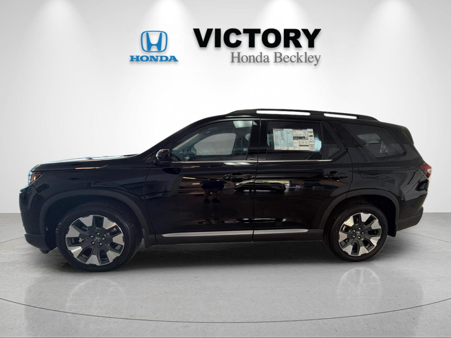 New 2026 Crystal Black Pearl Honda AWD Elite image 2