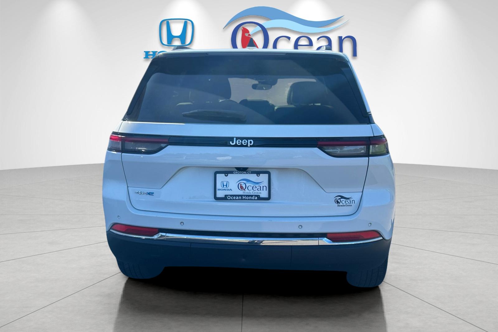 Used 2024 Bright White Clearcoat Jeep 4xe image 4