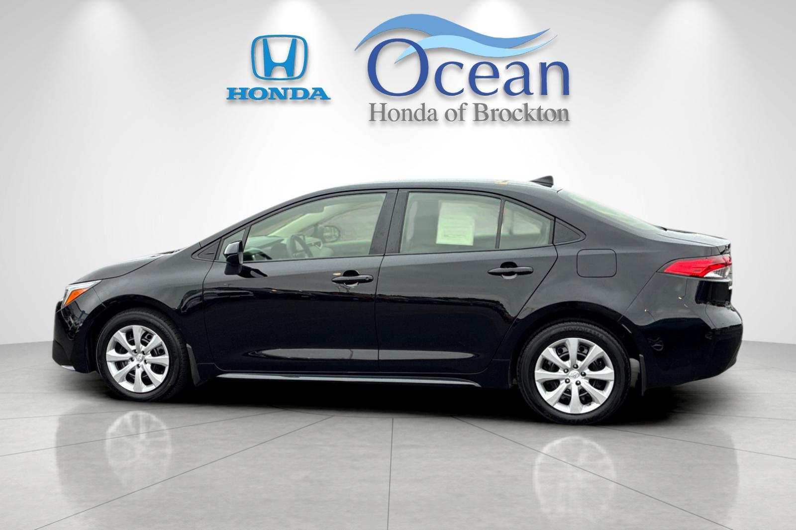 Used 2025 Midnight Black Metallic Toyota LE image 6
