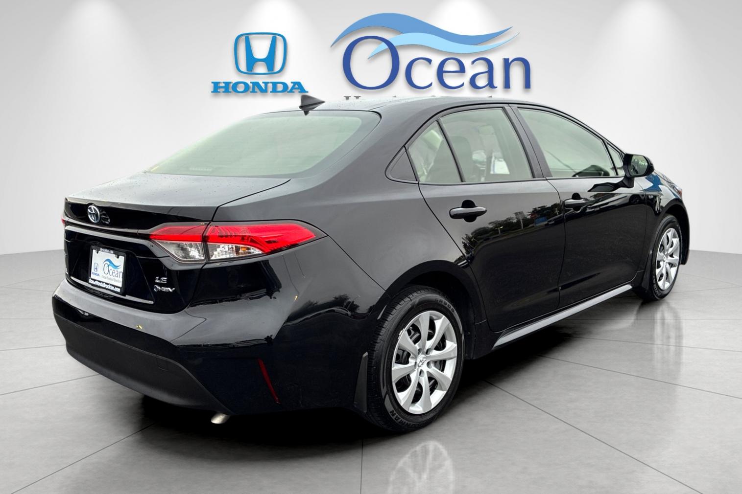 Used 2025 Midnight Black Metallic Toyota LE image 3