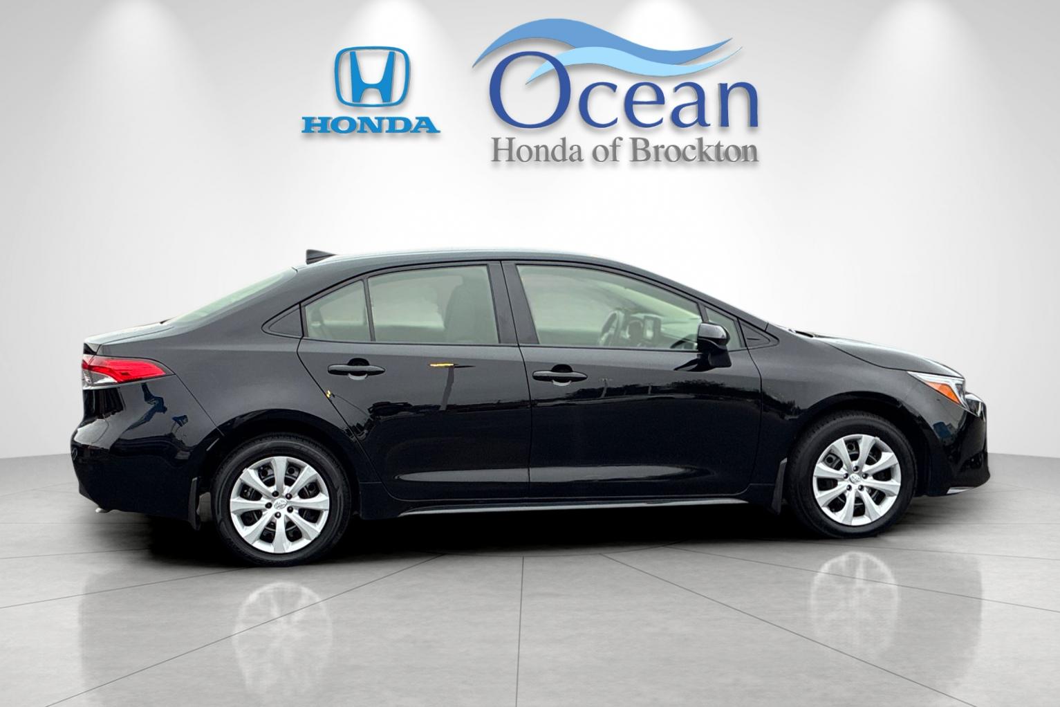Used 2025 Midnight Black Metallic Toyota LE image 2