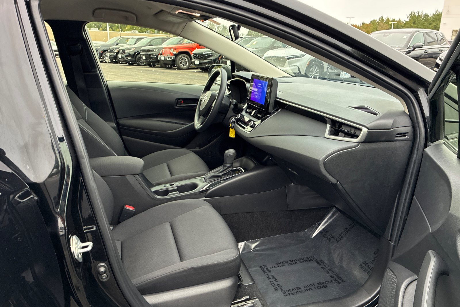 Used 2025 Midnight Black Metallic Toyota LE image 21
