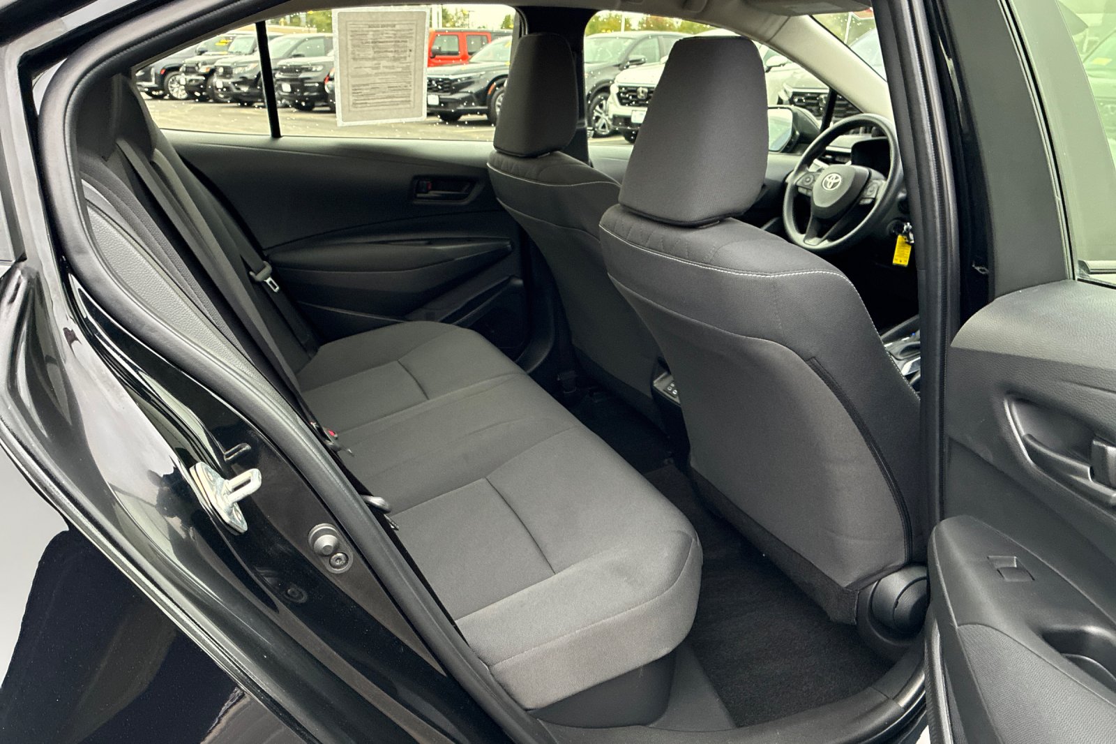 Used 2025 Midnight Black Metallic Toyota LE image 18