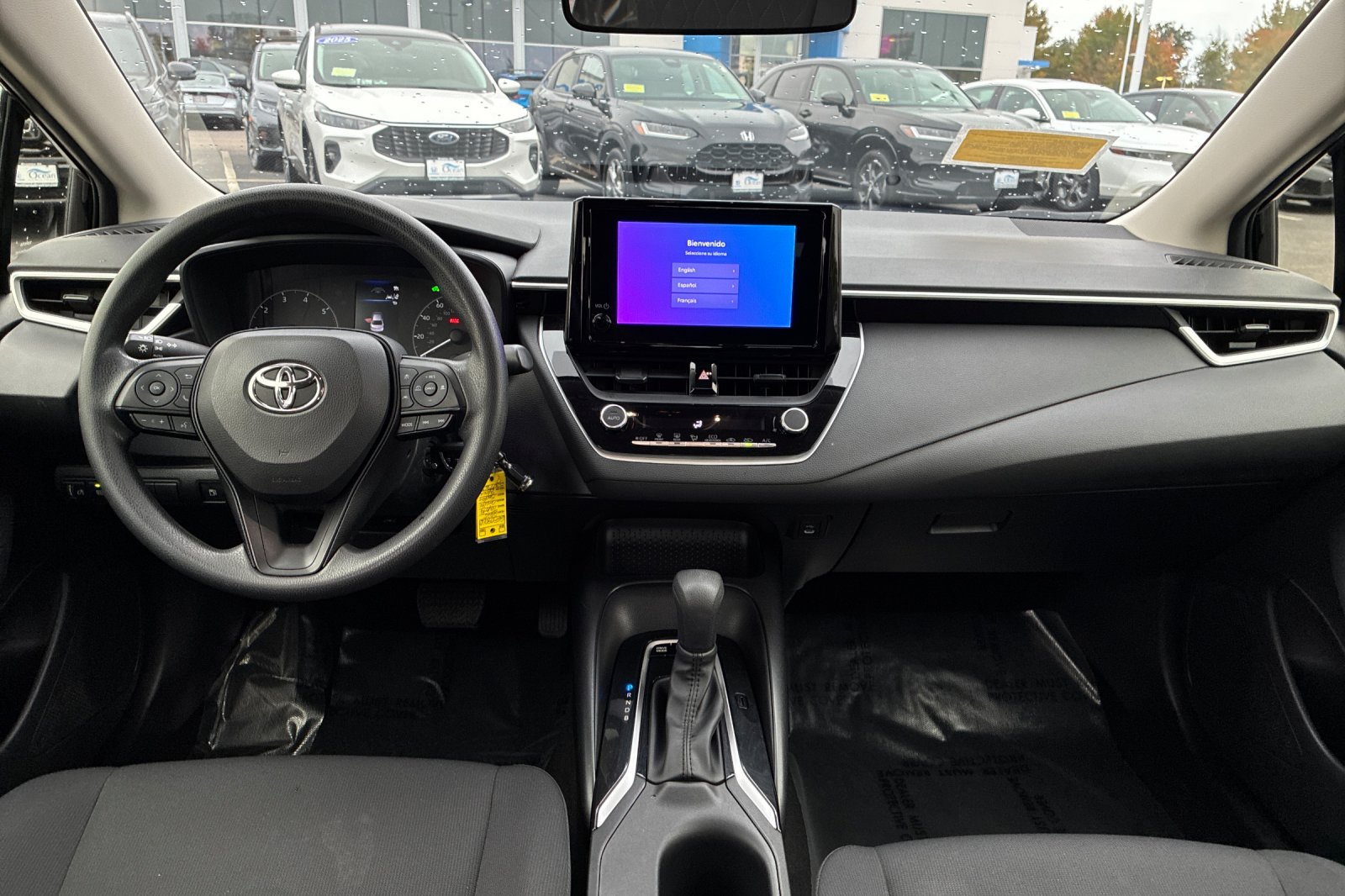 Used 2025 Midnight Black Metallic Toyota LE image 16