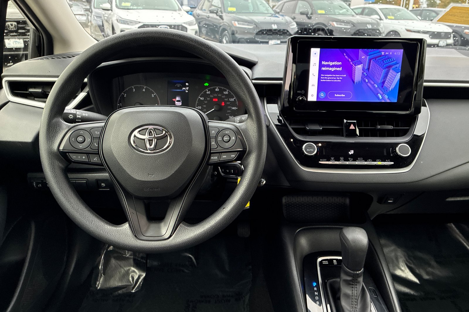 Used 2025 Midnight Black Metallic Toyota LE image 17
