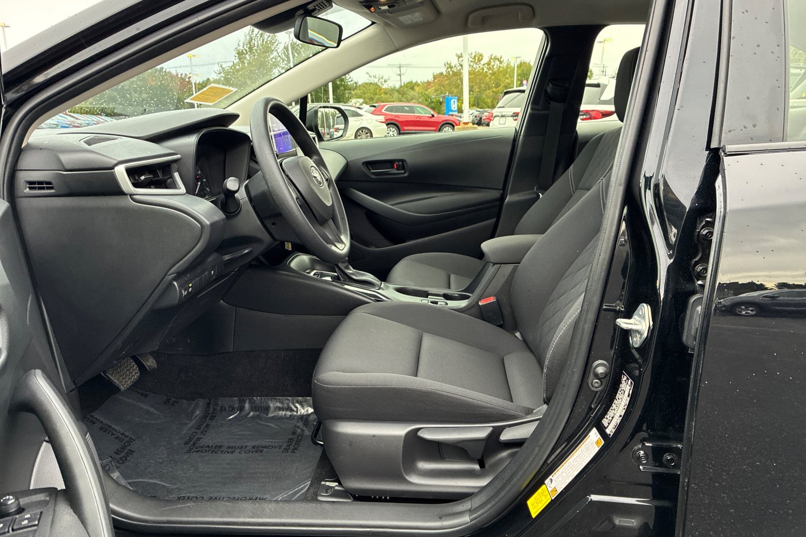Used 2025 Midnight Black Metallic Toyota LE image 11