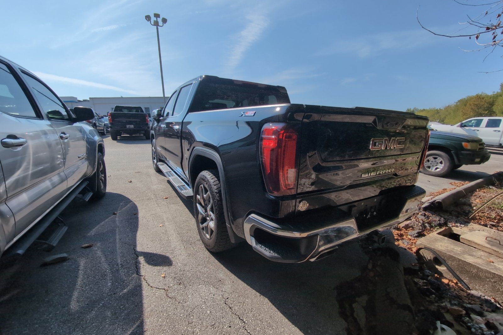 Used 2024 Black GMC SLT image 6