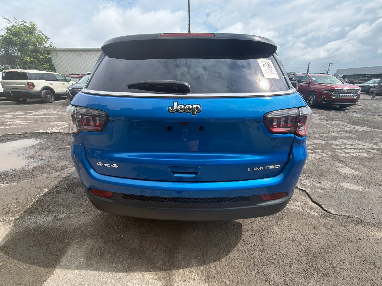 Used 2023 Laser Blue Jeep Limited image 4