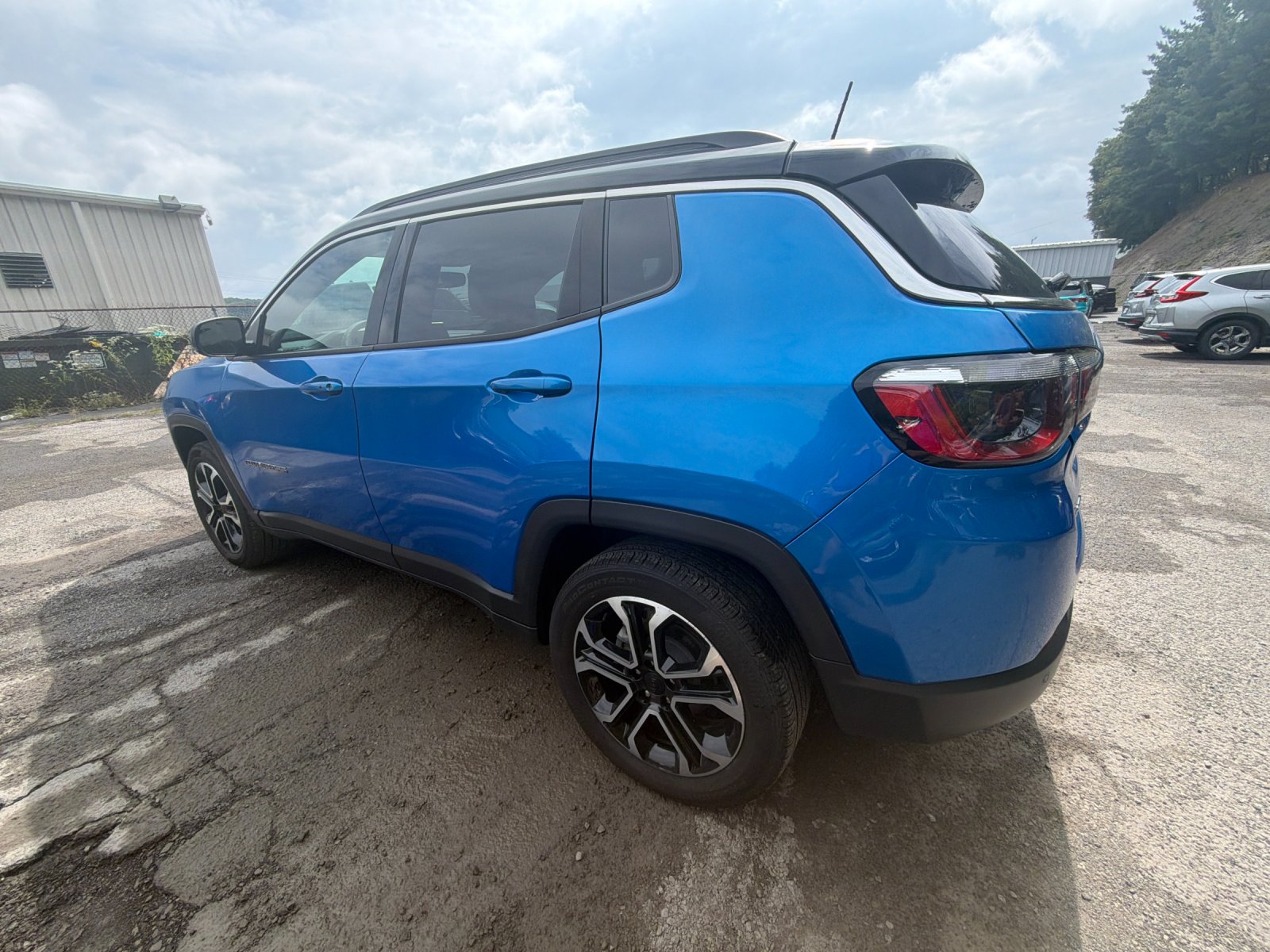 Used 2023 Laser Blue Jeep Limited image 3