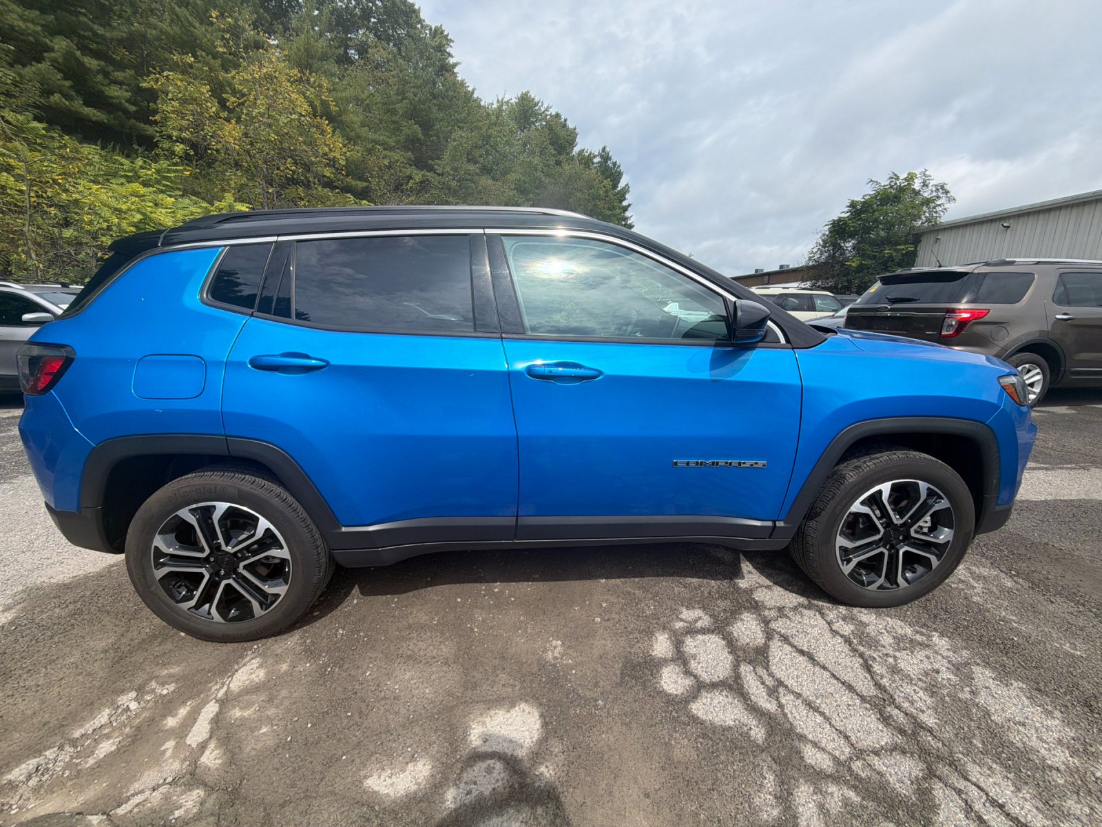 Used 2023 Laser Blue Jeep Limited image 6