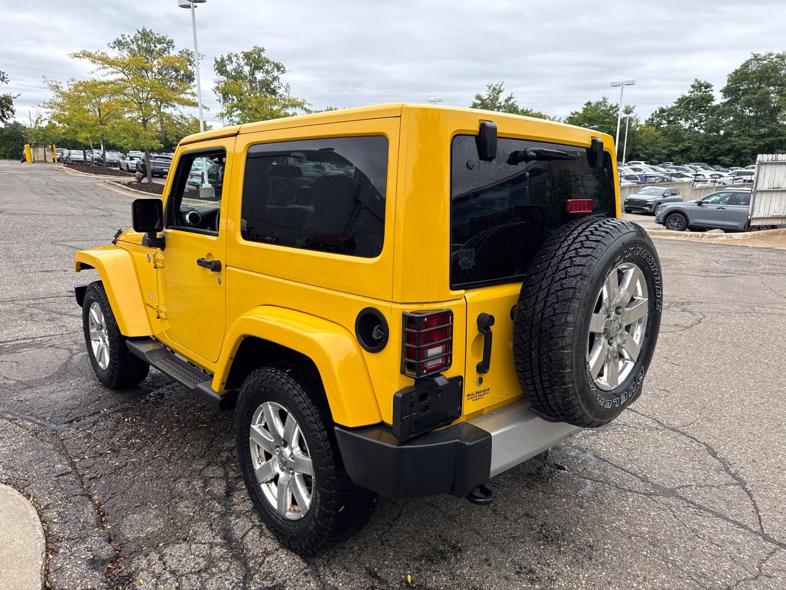 Used 2015 Baja Yellow Clearcoat Jeep Sahara image 5