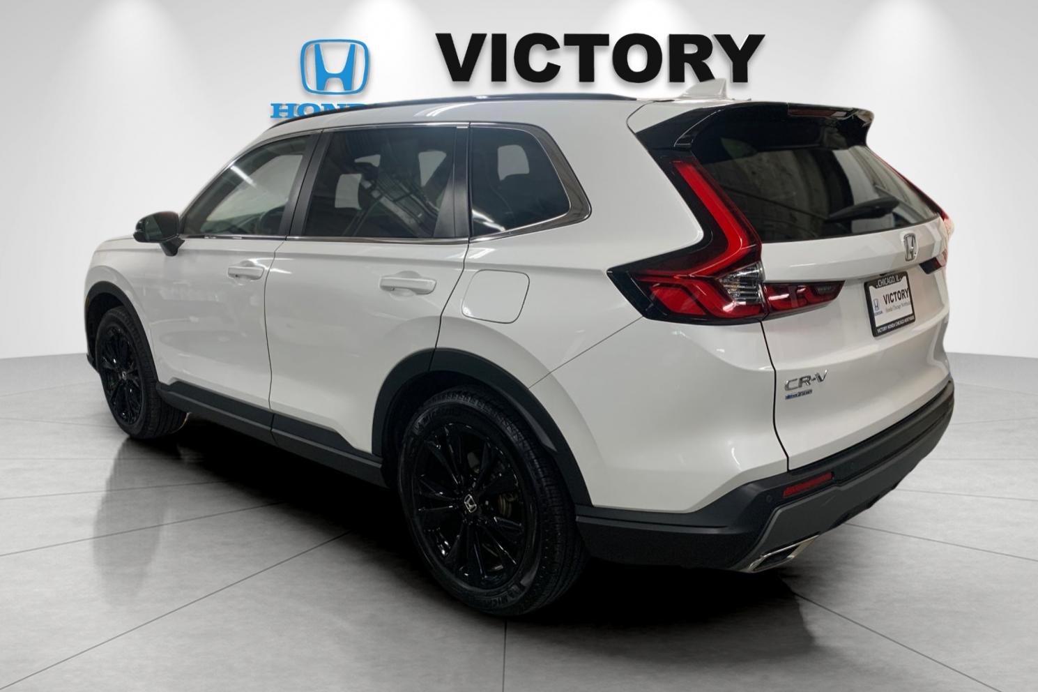 Certified Used 2025 Platinum White Pearl Honda HYBRID AWD SP TRG image 4