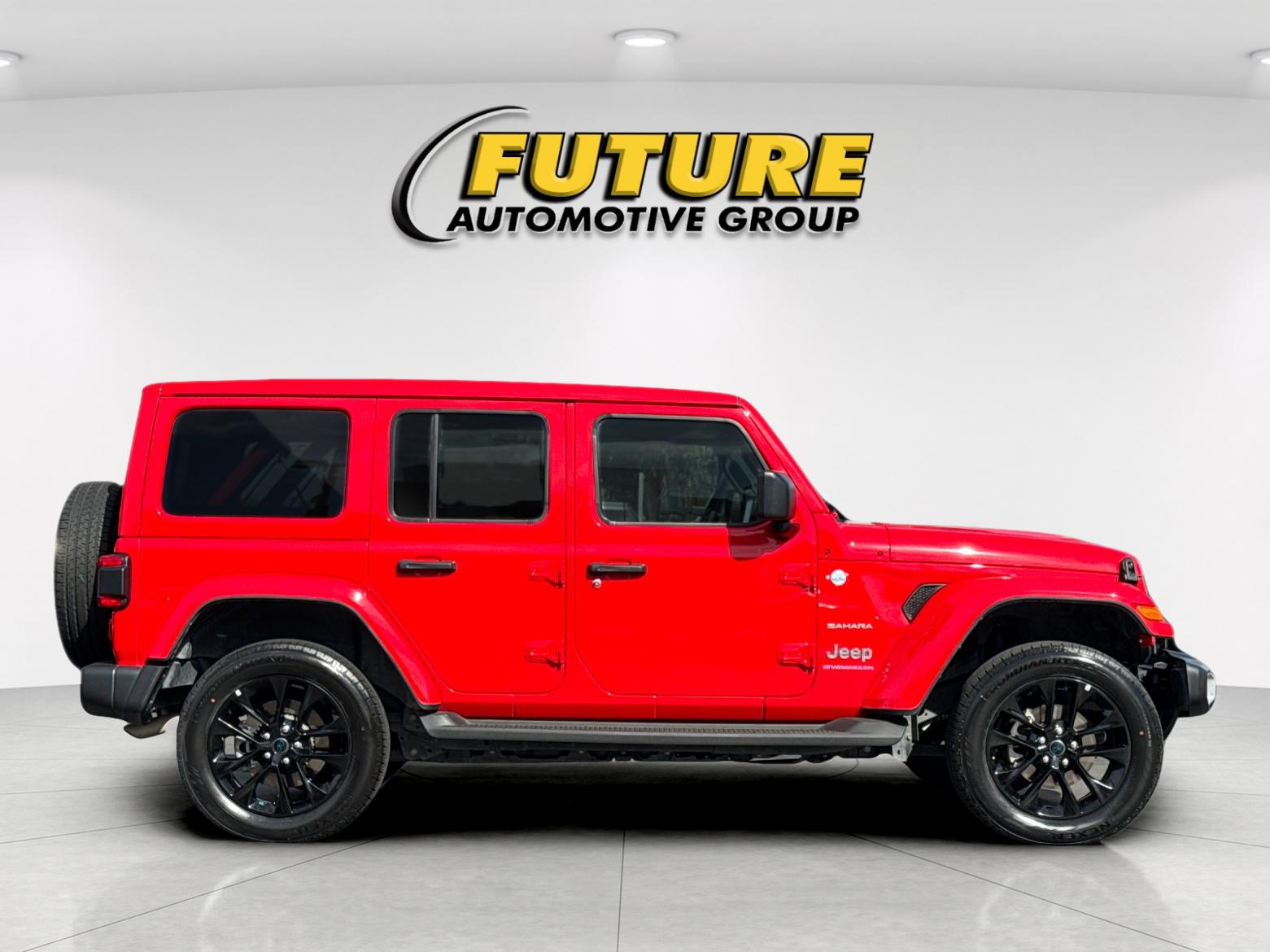 Used 2024 Red Jeep Sahara 4xe image 2