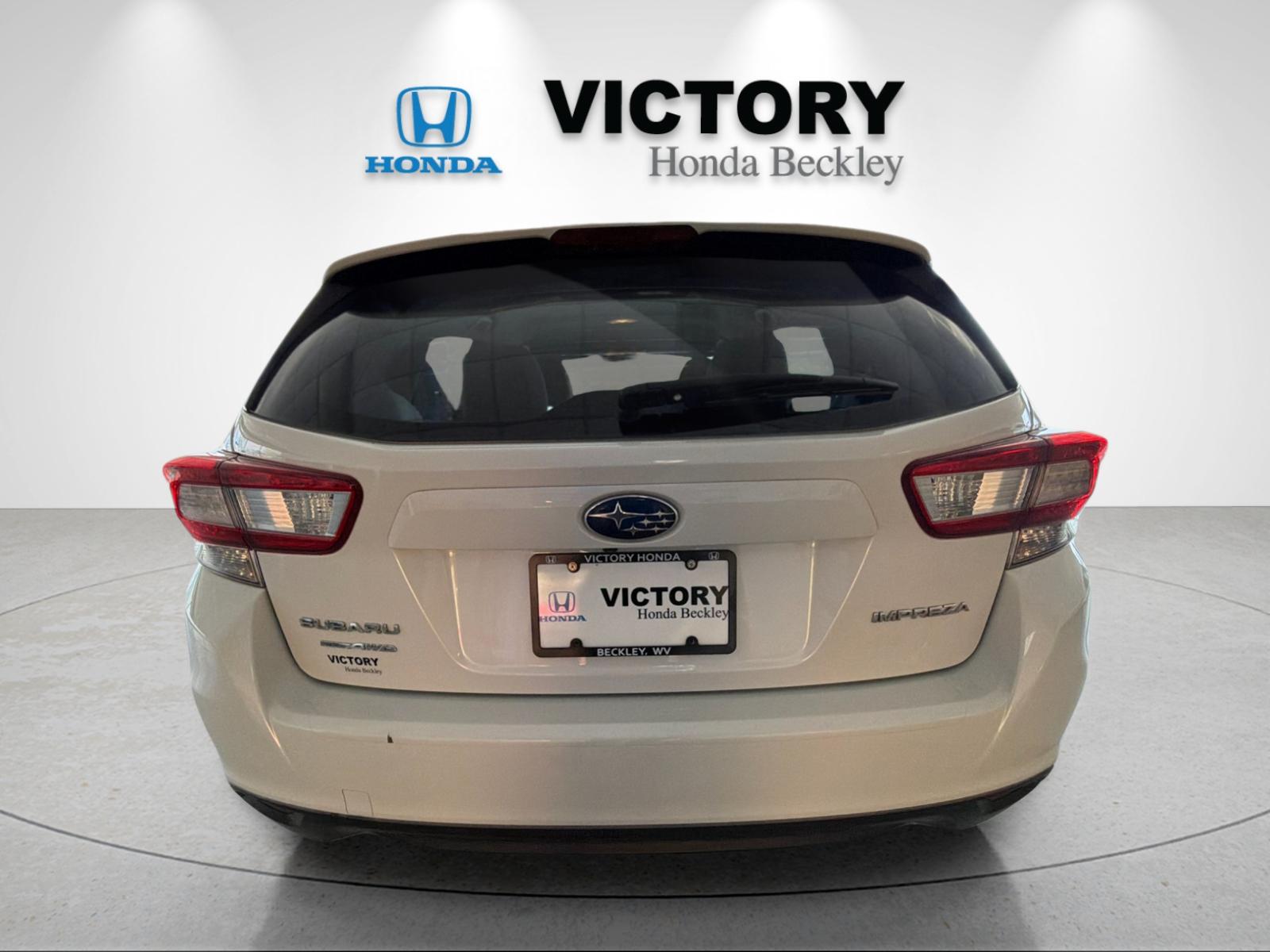 Used 2019 Crystal White Pearl Subaru 2.0i Premium image 4