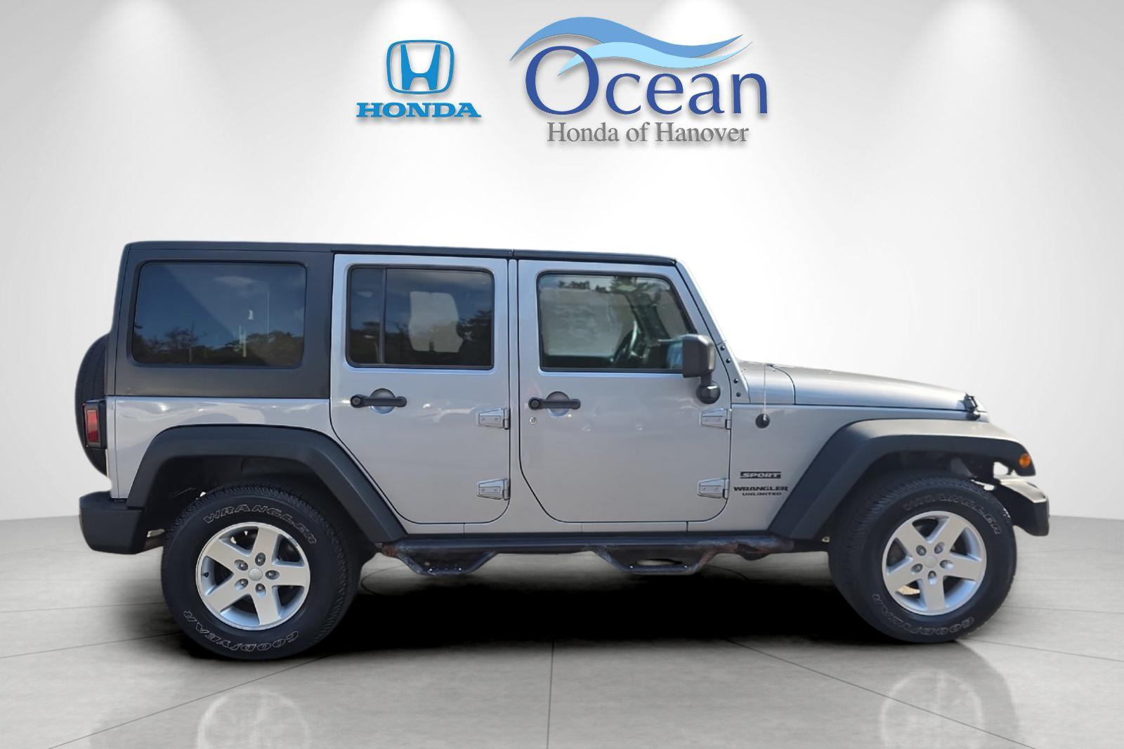 Used 2016 Billet Silver Metallic Clearcoat Jeep Unlimited Sport image 2