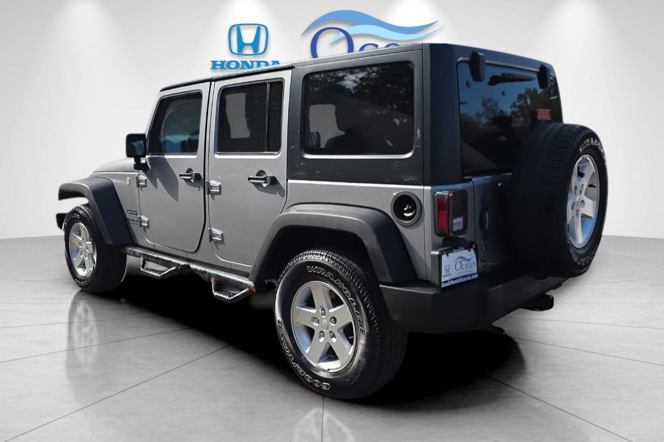 Used 2016 Billet Silver Metallic Clearcoat Jeep Unlimited Sport image 5