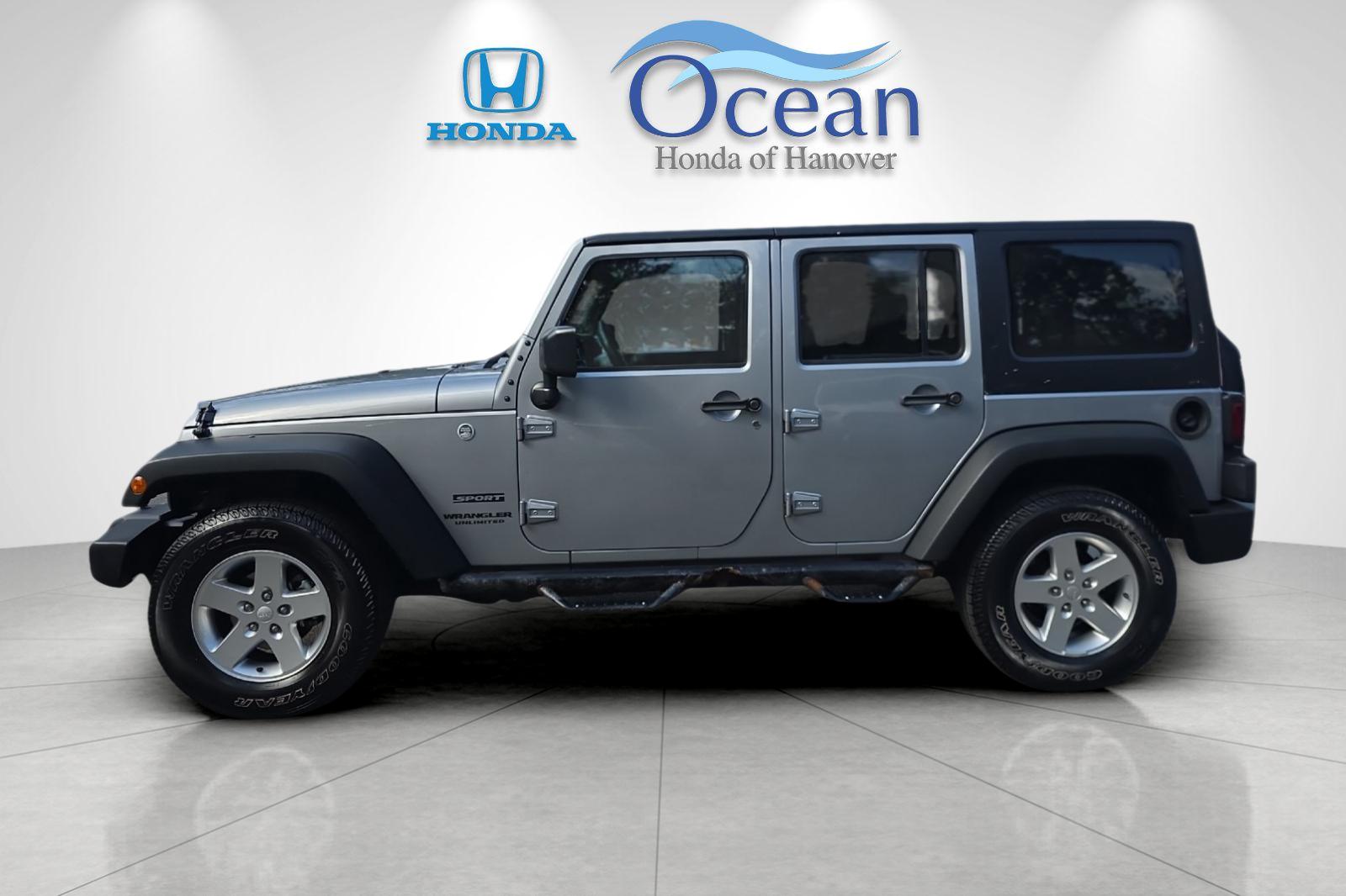 Used 2016 Billet Silver Metallic Clearcoat Jeep Unlimited Sport image 6