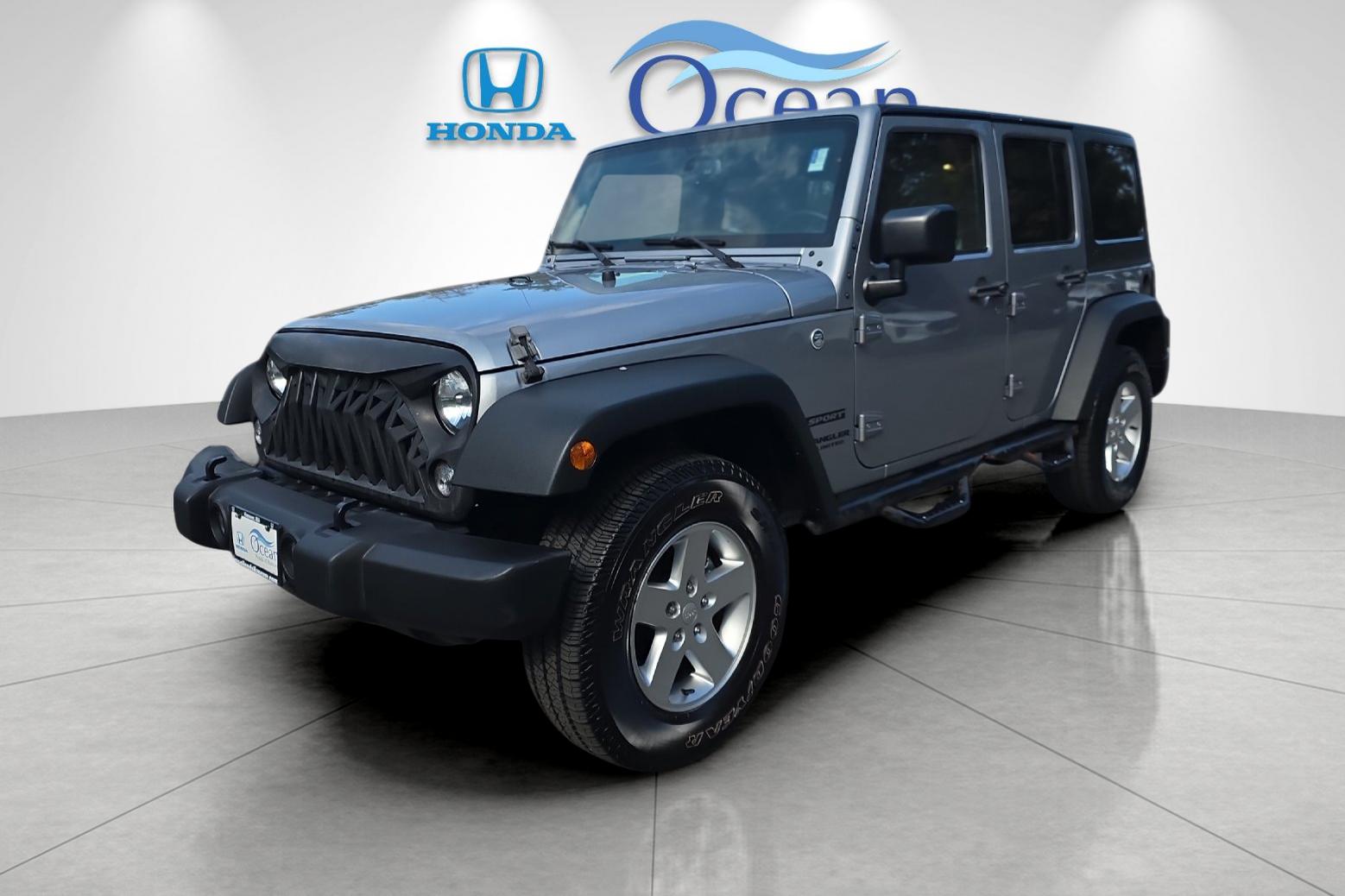 Used 2016 Billet Silver Metallic Clearcoat Jeep Unlimited Sport image 7