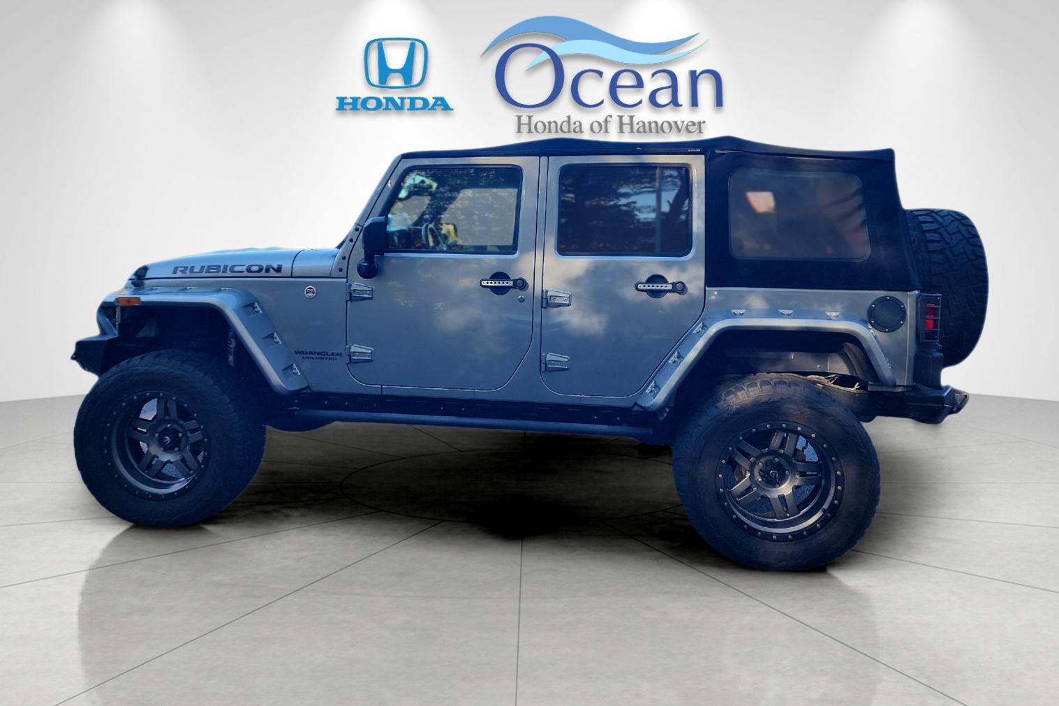 Used 2016 Billet Silver Metallic Clearcoat Jeep Unlimited Rubicon image 6