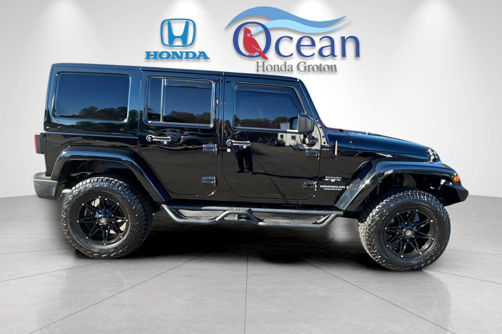 Used 2016 Black Clearcoat Jeep Unlimited Sahara image 2