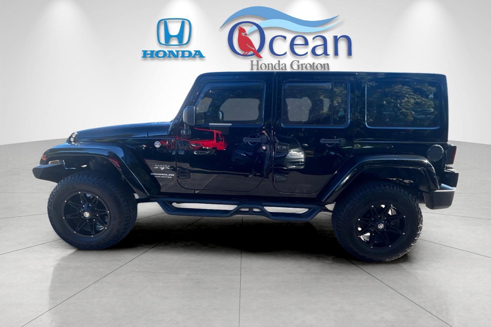 Used 2016 Black Clearcoat Jeep Unlimited Sahara image 6