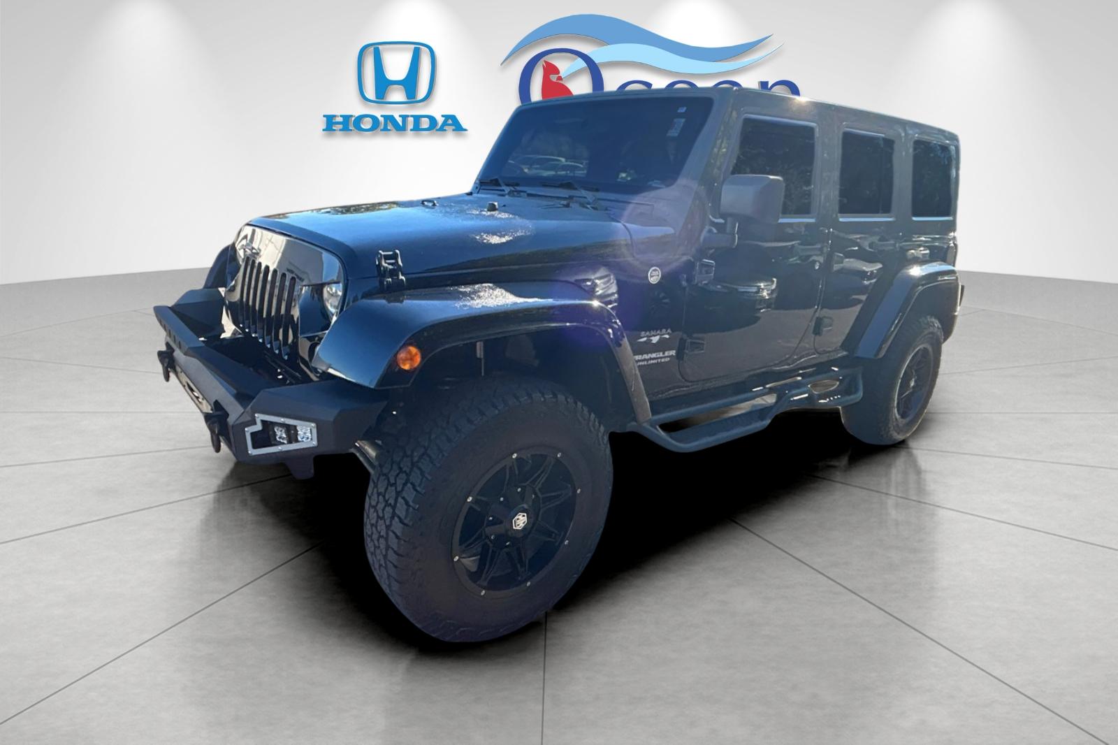 Used 2016 Black Clearcoat Jeep Unlimited Sahara image 7