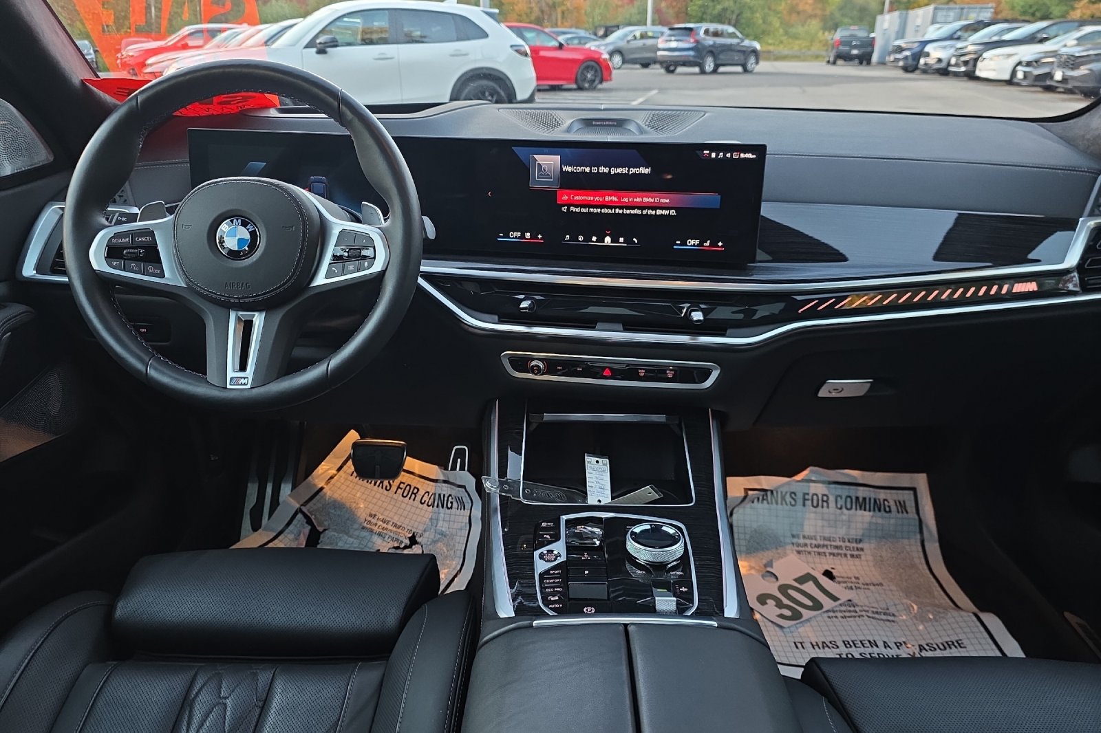 Used 2026 Black Sapphire Metallic BMW M60i image 14