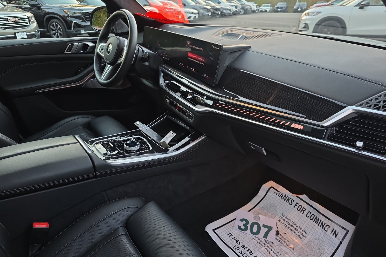 Used 2026 Black Sapphire Metallic BMW M60i image 17