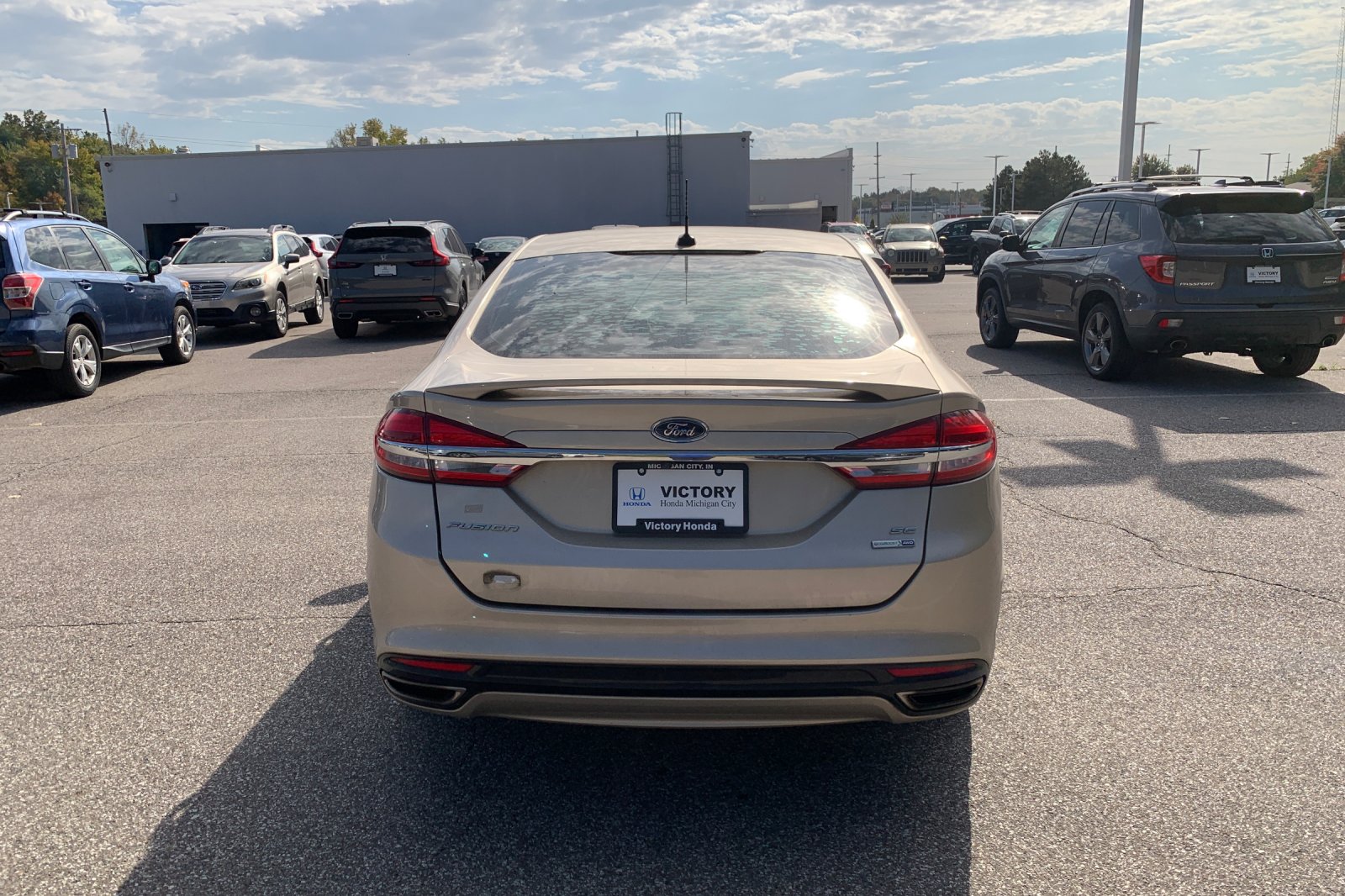 Used 2017 Gold Ford SE image 4